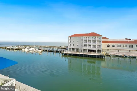 a view of a lake with a building in front of it