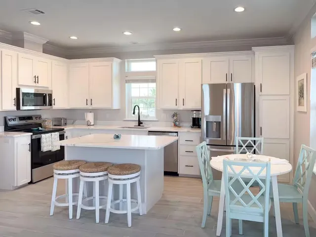 a bedroom with a bed and a lamp