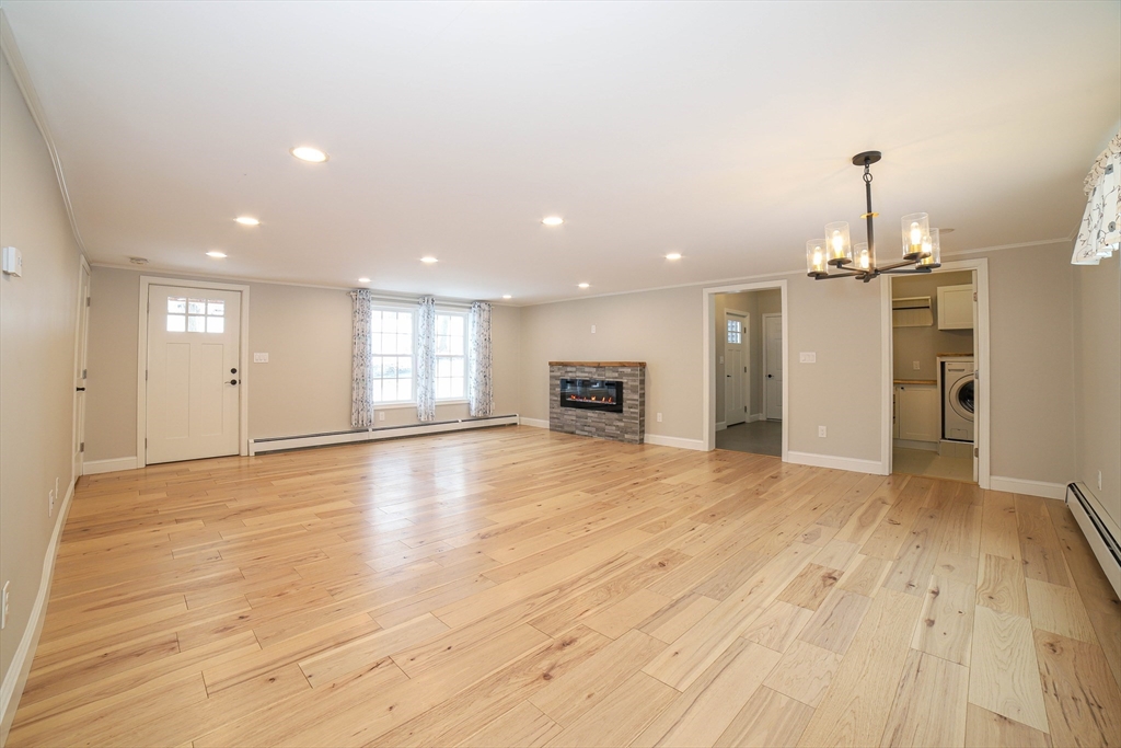 3 Woods Road Westminster, MA 01473 - Photo 12 of 42 a view of a kitchen with a sink and a stove