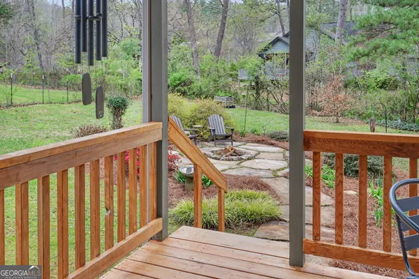 a view of a porch with a yard of the house