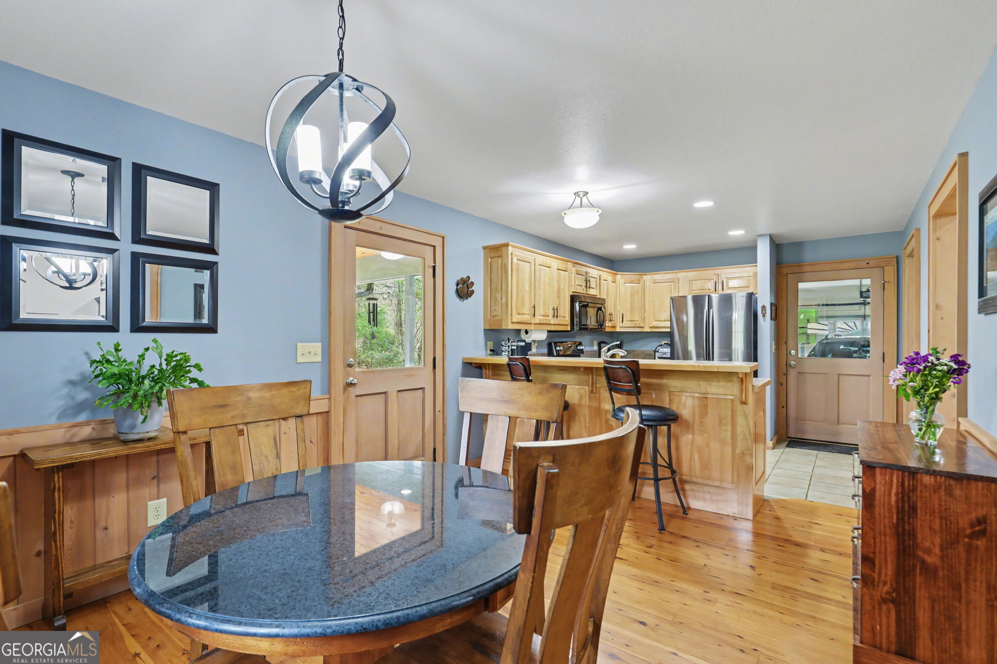 18 Saga Mountain Road Tiger, GA 30576 - Photo 19 of 33 a view of a dining room with furniture a livingroom and chandelier