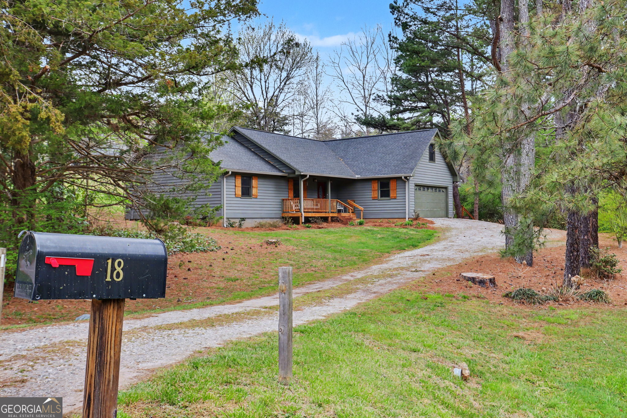 18 Saga Mountain Road Tiger, GA 30576 - Photo 2 of 33 a front view of a house with a yard and tree