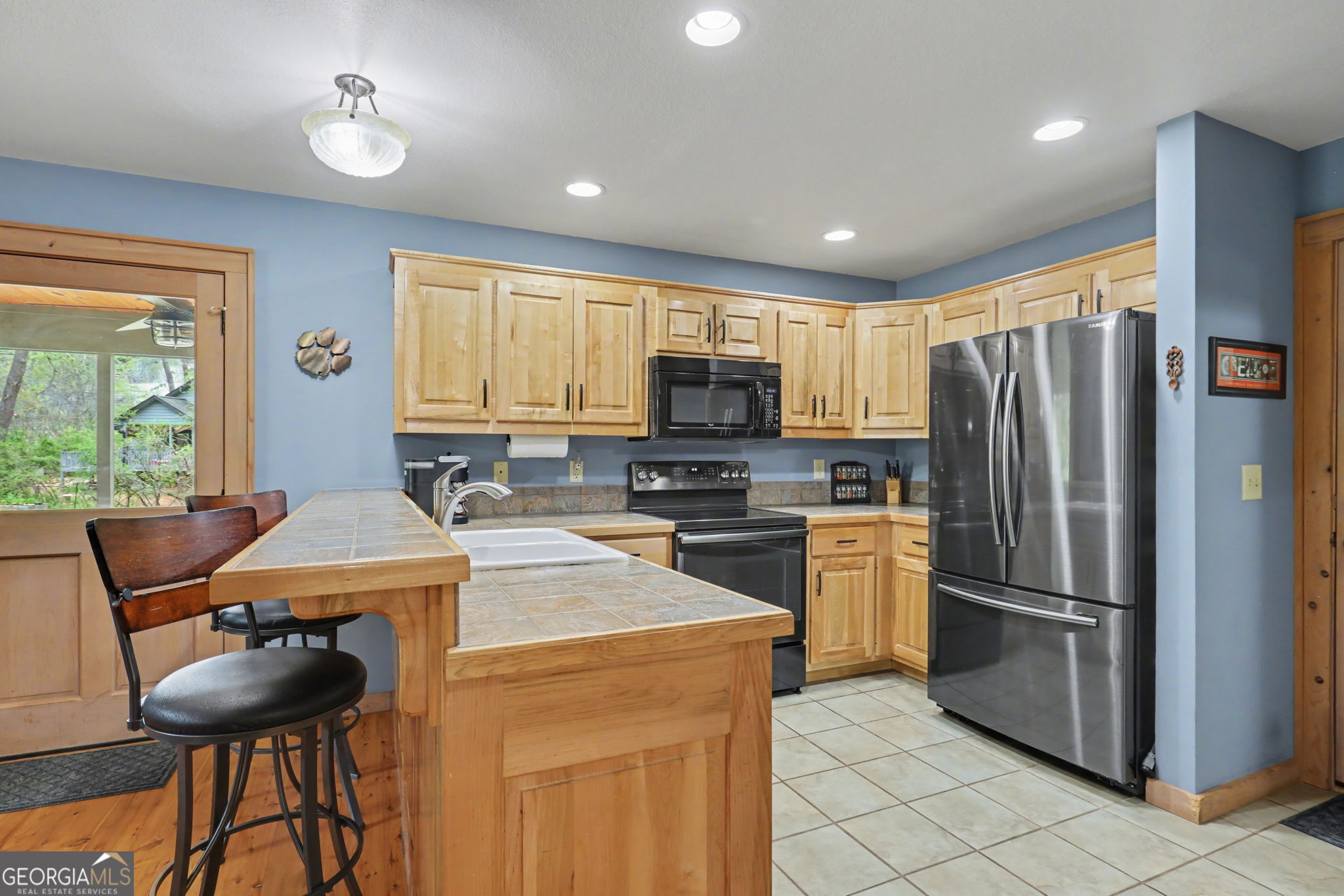 18 Saga Mountain Road Tiger, GA 30576 - Photo 21 of 33 a kitchen with refrigerator cabinets and furniture