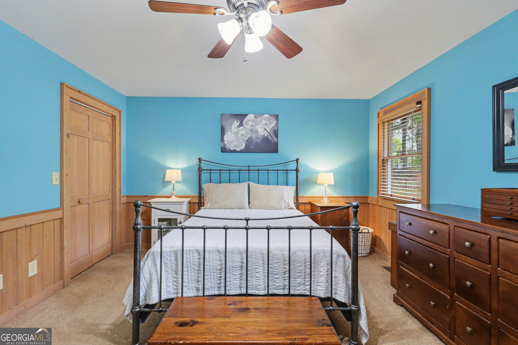 18 Saga Mountain Road Tiger, GA 30576 - Photo 27 of 33 a bedroom with a bed and a chandelier