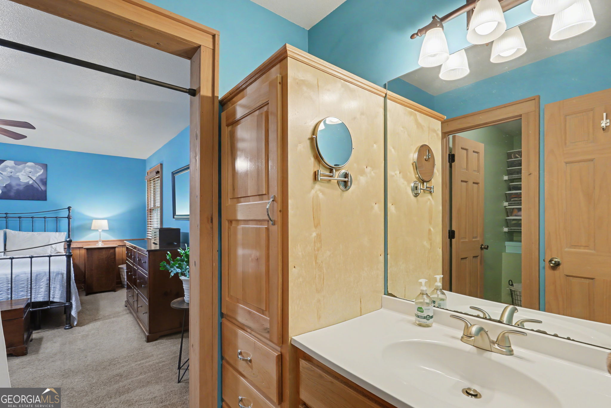 18 Saga Mountain Road Tiger, GA 30576 - Photo 31 of 33 a bathroom with a sink a mirror and a shower