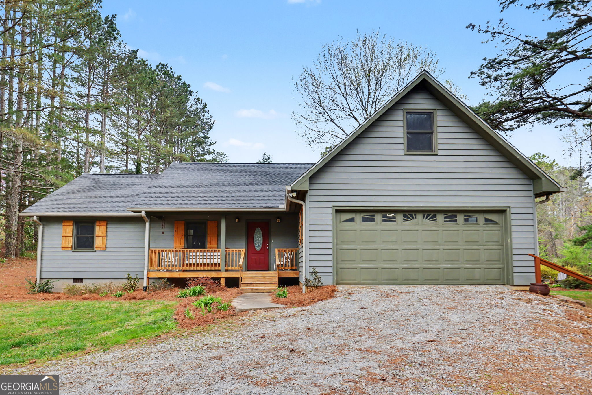 18 Saga Mountain Road Tiger, GA 30576 - Photo 4 of 33 a front view of a house with a yard and garage