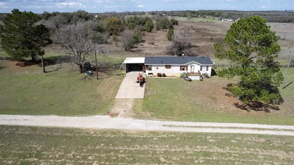 a view of a yard with an outdoor space
