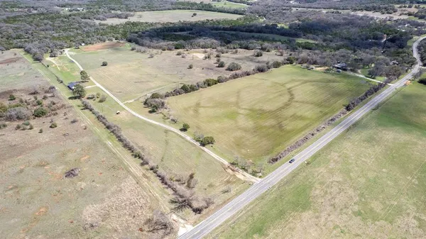 a view of a yard with an outdoor space