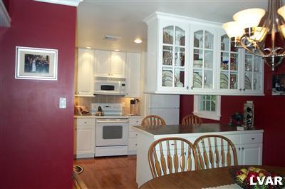 19 Balson Road Stroudsburg, PA 18360 - Photo 3 of 17 a view of a kitchen with stainless steel appliances granite countertop a stove a sink and dishwasher
