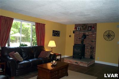 19 Balson Road Stroudsburg, PA 18360 - Photo 5 of 17 a living room with furniture and a large window