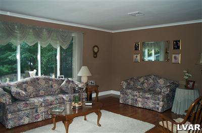 19 Balson Road Stroudsburg, PA 18360 - Photo 6 of 17 a living room with furniture and a large window