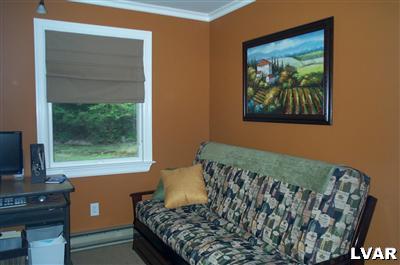 19 Balson Road Stroudsburg, PA 18360 - Photo 7 of 17 a bedroom with a bed and a window
