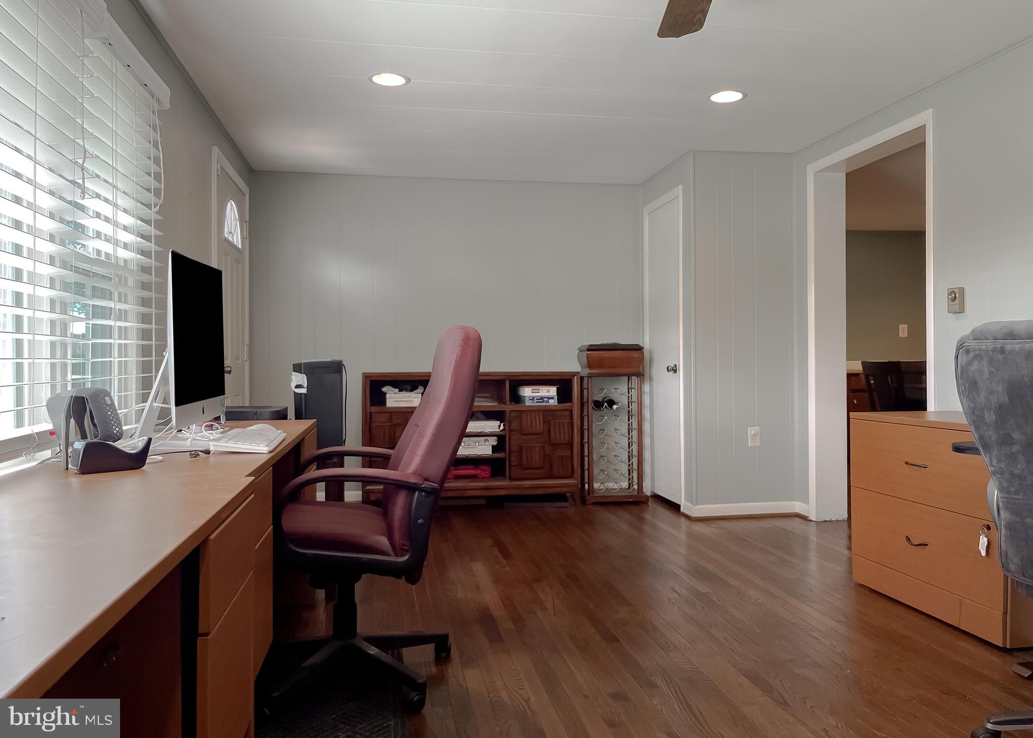 3345 Ferry Landing Road Dunkirk, MD 20754 - Photo 21 of 64 a view of a workspace with furniture and wooden floor