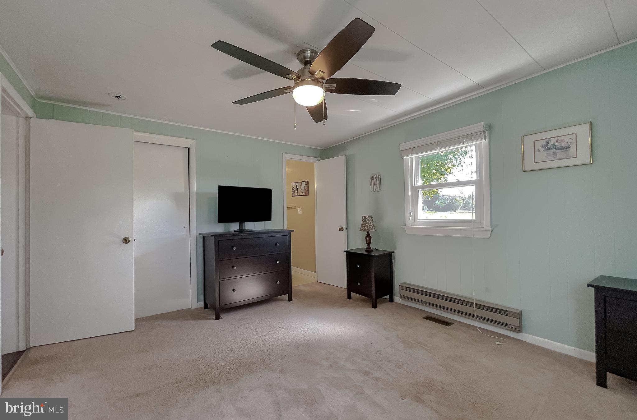 3345 Ferry Landing Road Dunkirk, MD 20754 - Photo 38 of 64 a living room with furniture and a flat screen tv