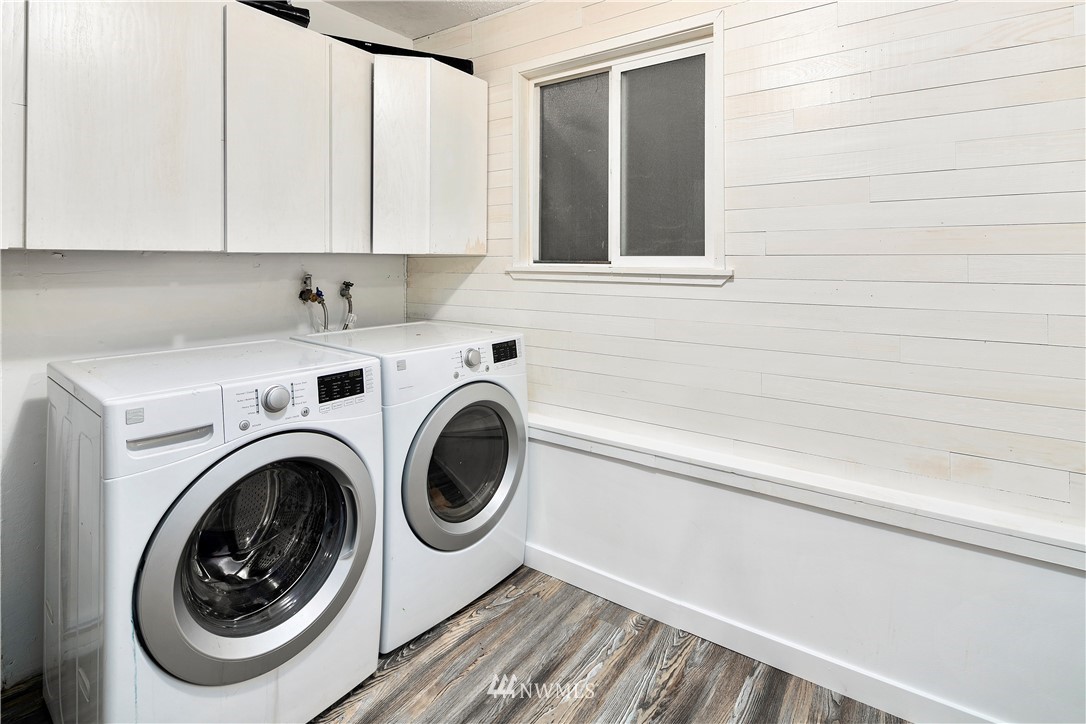 18433 126th Place Southeast Renton, WA 98058 - Photo 18 of 22 a utility room with dryer and washer