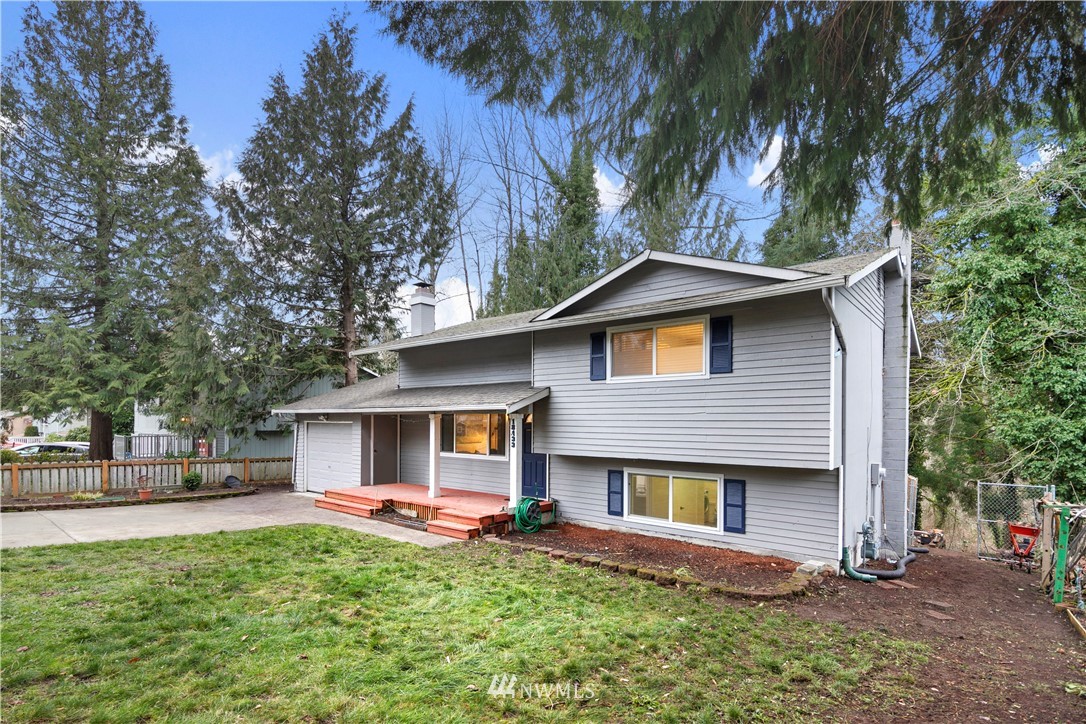 18433 126th Place Southeast Renton, WA 98058 - Photo 2 of 22 a view of a house with backyard and sitting area