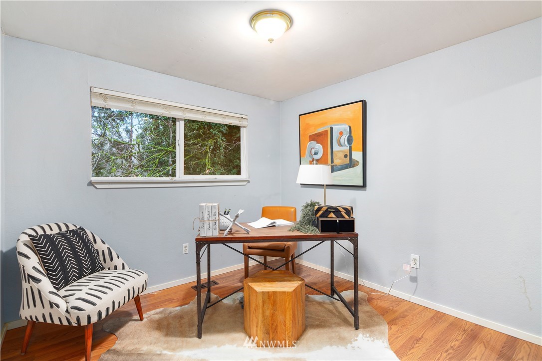 18433 126th Place Southeast Renton, WA 98058 - Photo 7 of 22 a work room with furniture and windows