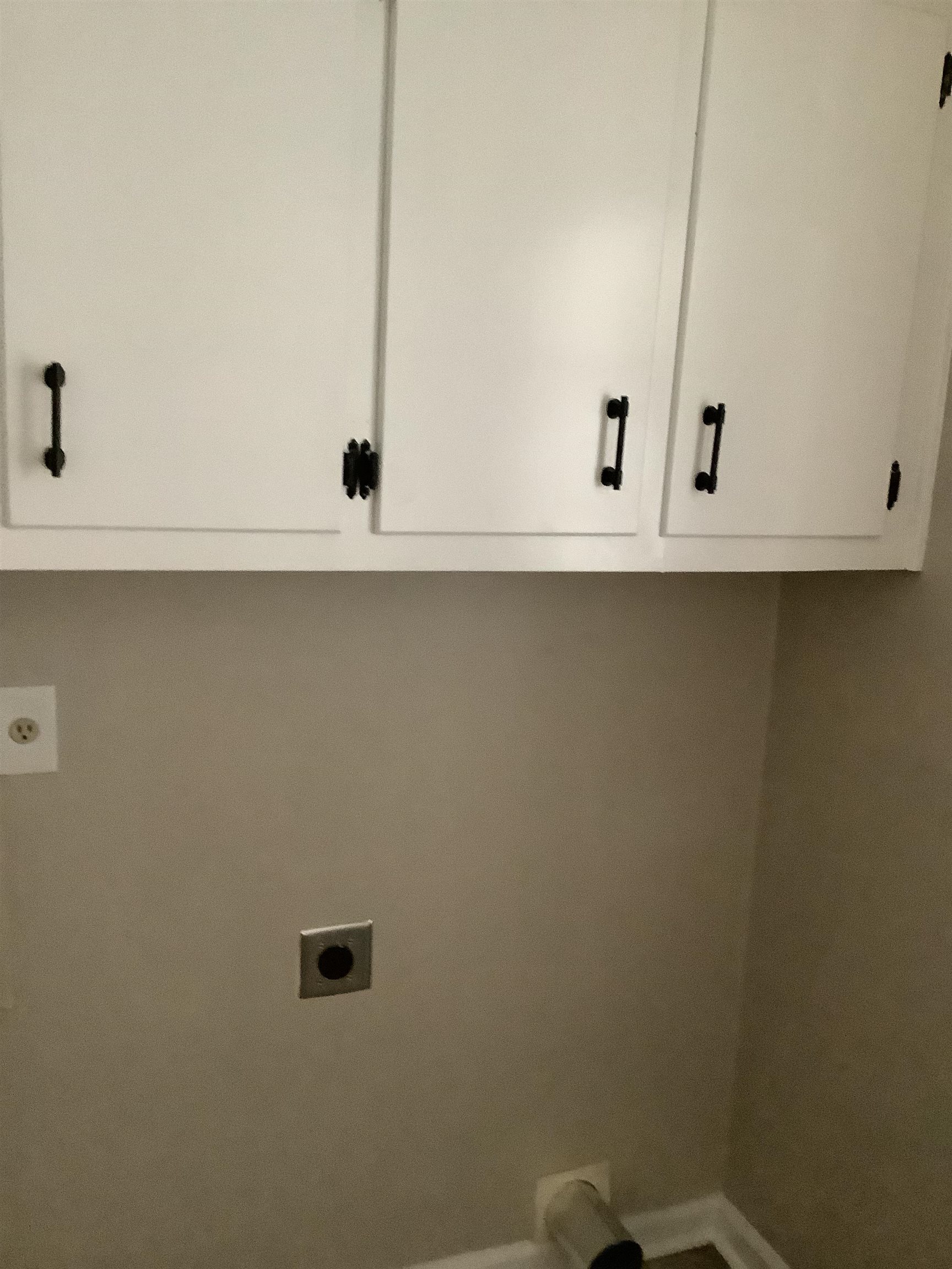 4179 Riche Road Memphis, TN 38128 - Photo 12 of 14 Laundry room featuring cabinets and electric dryer hookup