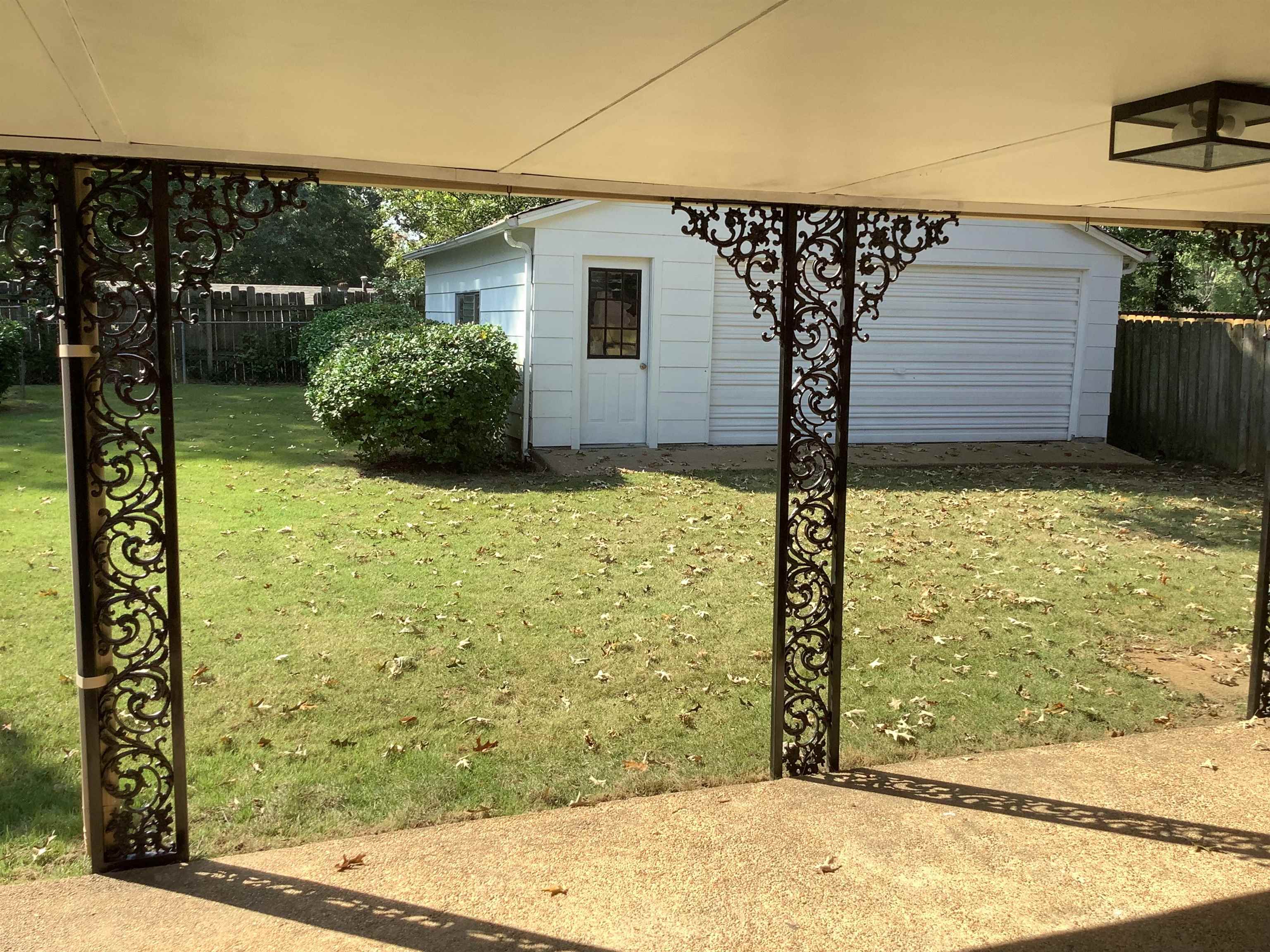 4179 Riche Road Memphis, TN 38128 - Photo 10 of 14 View of yard with a garage