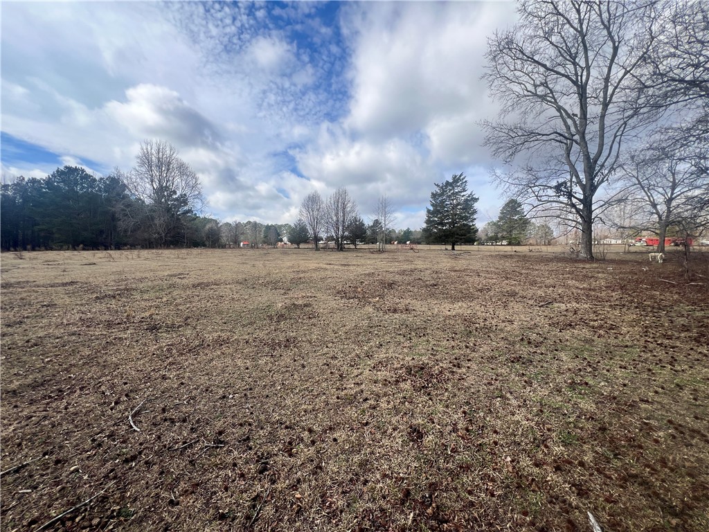 6980 Midway Road Pelzer, SC 29669 - Photo 10 of 15 Expansive acreage provides ample space for custom building, offering serene rural vistas.