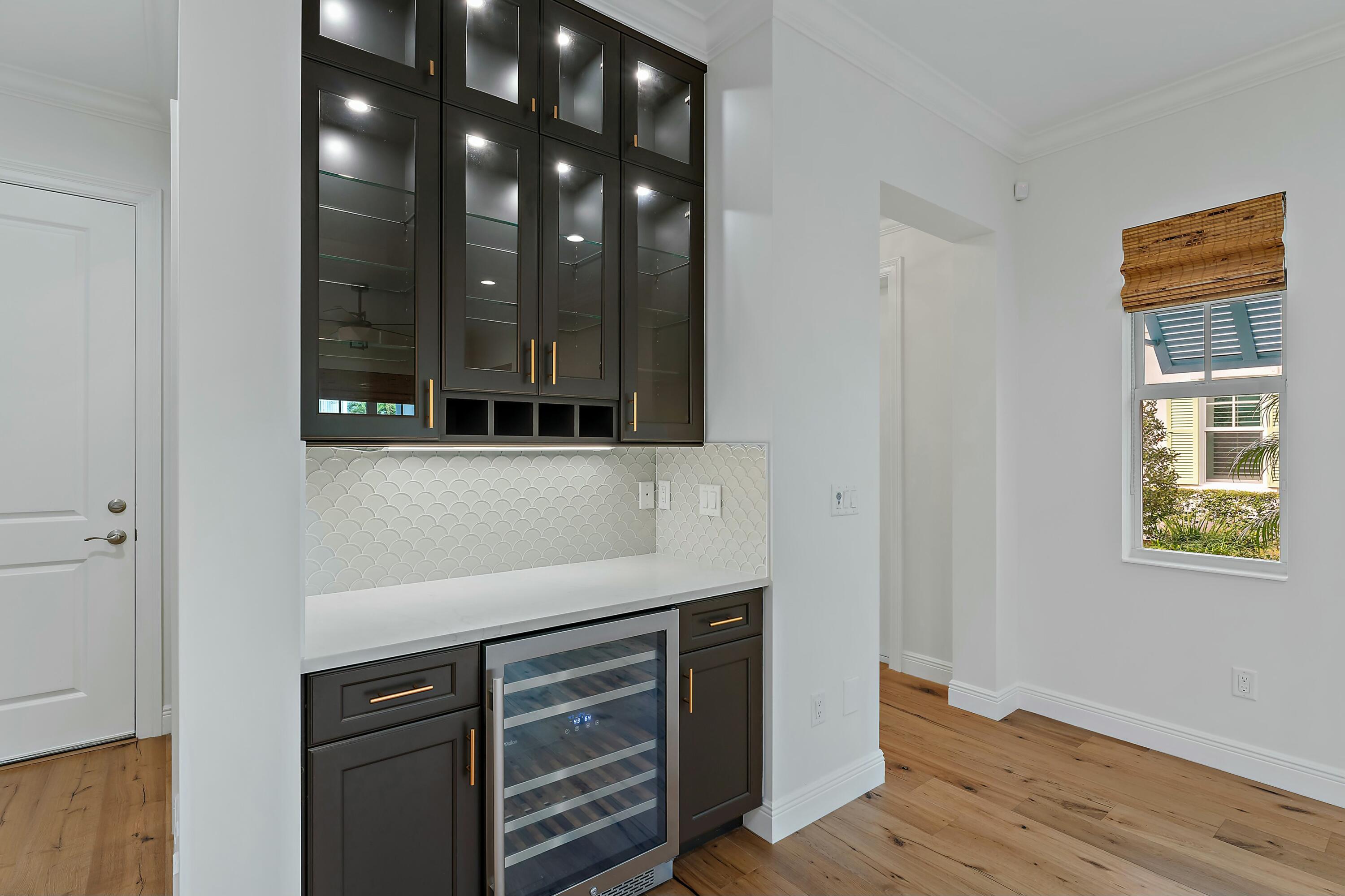 310 Inlet Waters Circle Jupiter, FL 33477 - Photo 9 of 32 lighting in cabinetry