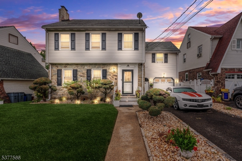 2785 Larchmont Road Union, NJ 07083 - Photo 3 of 15 a front view of a house with garden