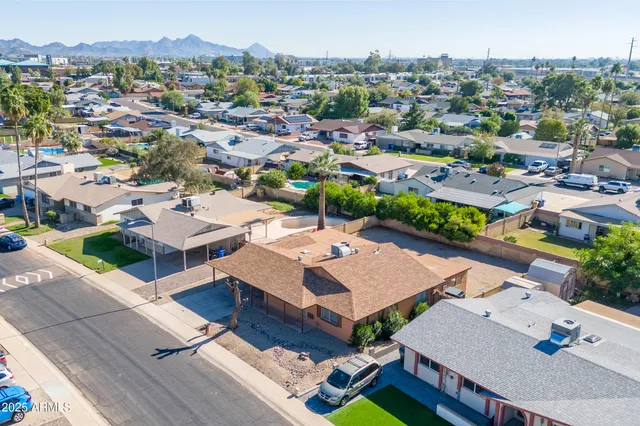 an aerial view of a house with a garden