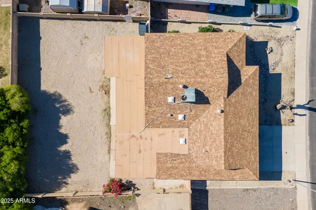 a bathroom with a shower and a mirror