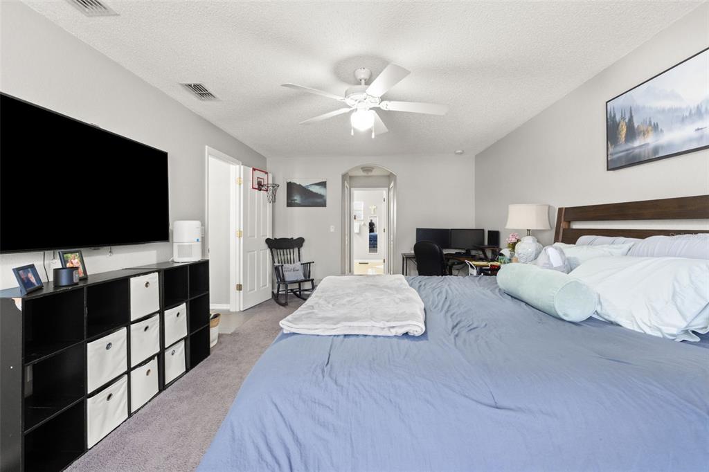 15335 Fleetwood Road Weeki Wachee, FL 34614 - Photo 12 of 40 a living room with furniture and a flat screen tv