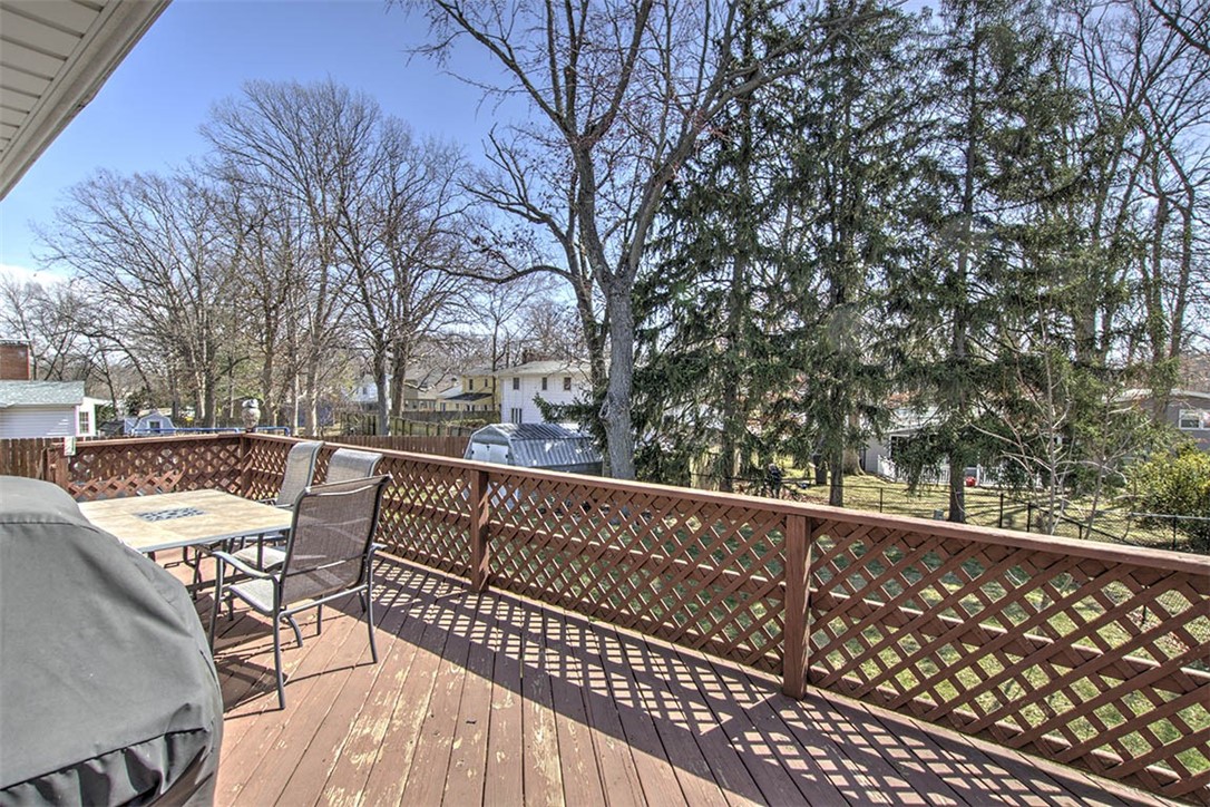 120 Point Bluff Drive Decatur, IL 62521 - Photo 26 of 34 a view of balcony with wooden floor and outdoor seating