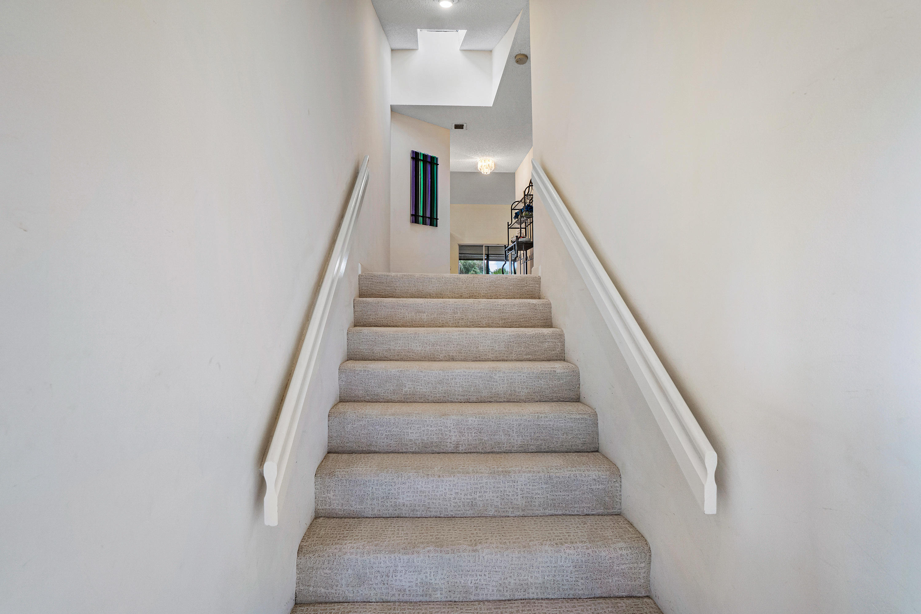 17348 Boca Club Boulevard, Unit 607 Boca Raton, FL 33487 - Photo 12 of 16 027-17348BocaClubBlvd-BocaRaton-FL-stair