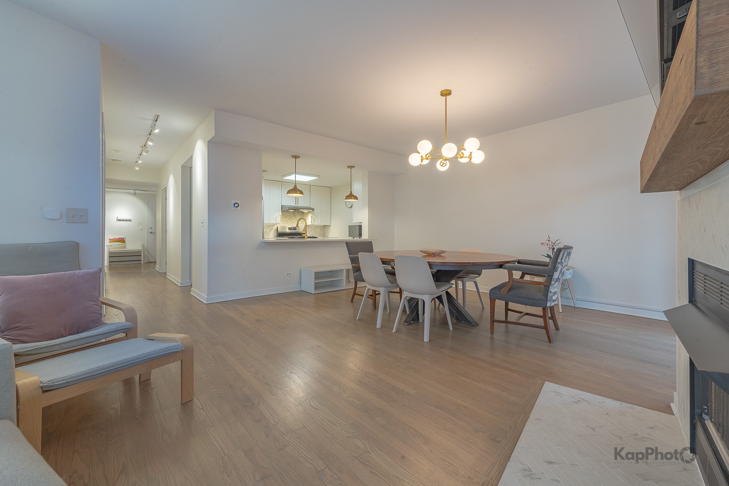 1151 West Washington Boulevard, Unit 125 Chicago, IL 60607 - Photo 12 of 28 a dining room with furniture and chandelier