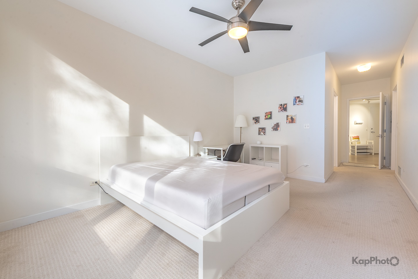 1151 West Washington Boulevard, Unit 125 Chicago, IL 60607 - Photo 19 of 28 a view of bedroom with furniture and ceiling fan