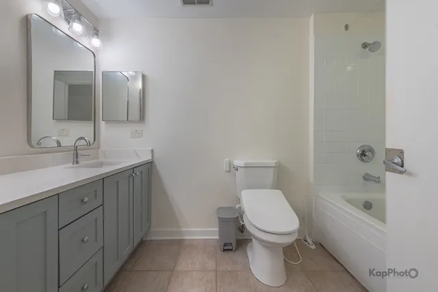 a view of storage and utility room with washer and dryer