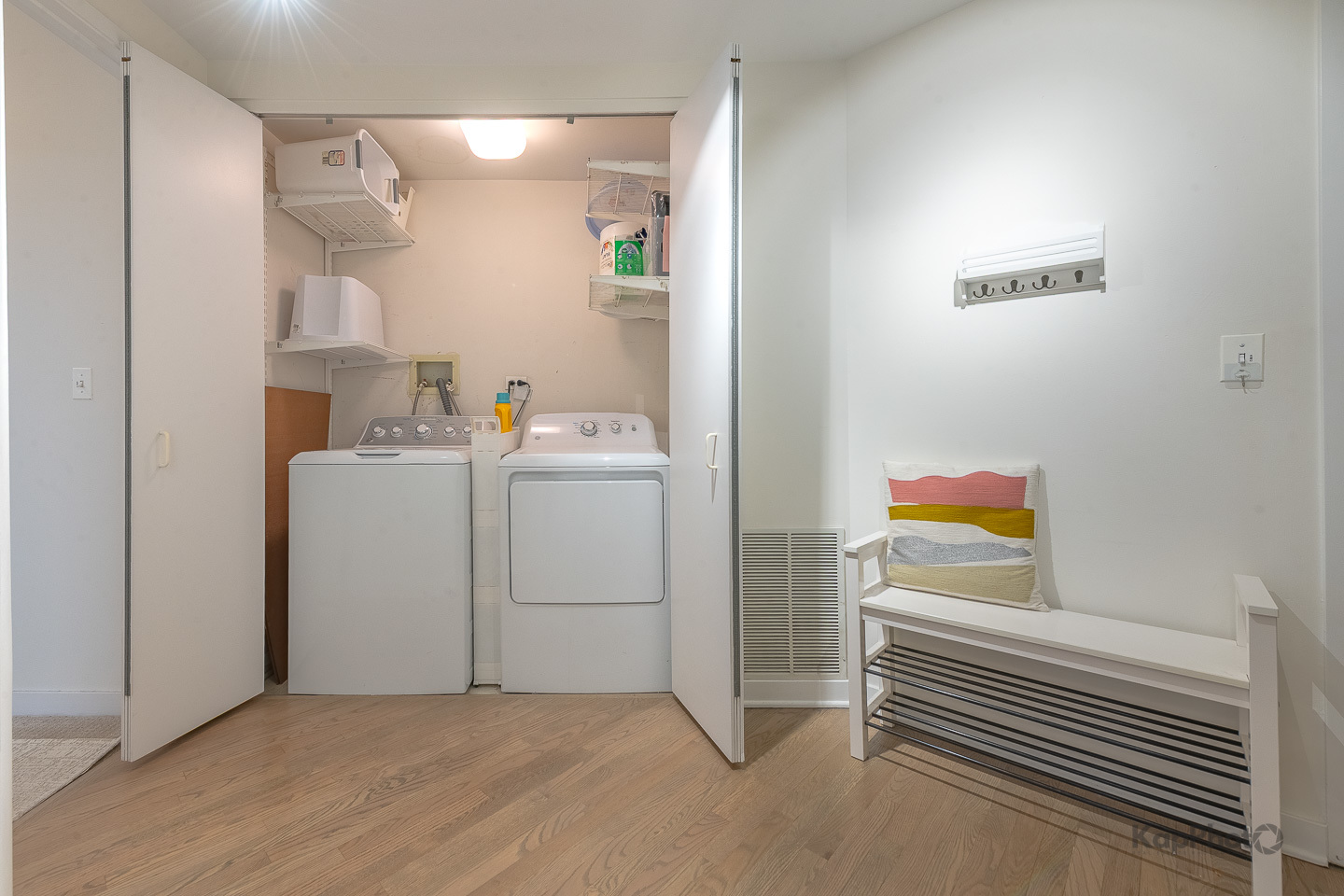 1151 West Washington Boulevard, Unit 125 Chicago, IL 60607 - Photo 26 of 28 a view of storage and utility room with washer and dryer