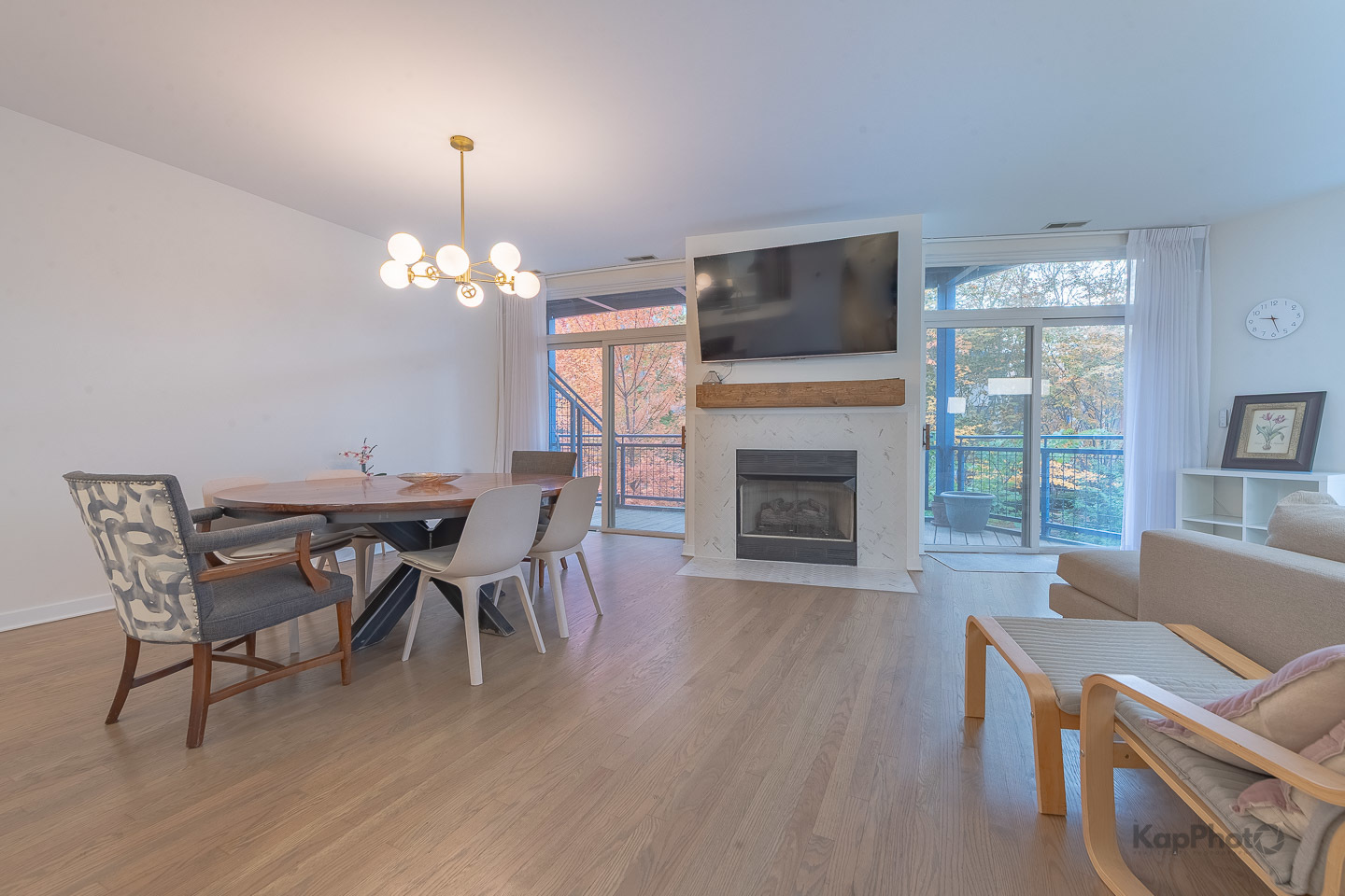 1151 West Washington Boulevard, Unit 125 Chicago, IL 60607 - Photo 10 of 28 a view of a dining room with furniture wooden floor and chandelier