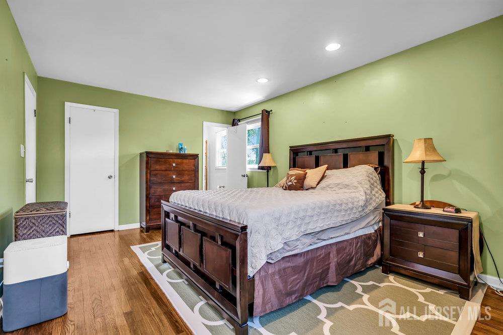 14 Academic Road East Brunswick, NJ 08816 - Photo 17 of 28 a bed room with a bed and a television