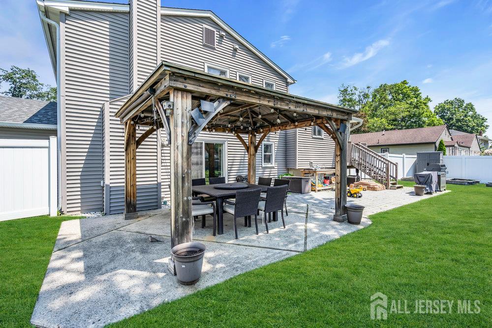 14 Academic Road East Brunswick, NJ 08816 - Photo 25 of 28 a patio with table and chairs