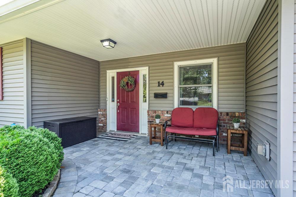 14 Academic Road East Brunswick, NJ 08816 - Photo 4 of 28 a front view of a house with outdoor seating