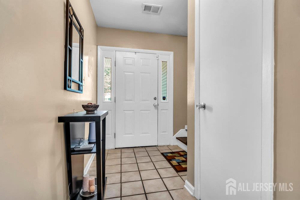 14 Academic Road East Brunswick, NJ 08816 - Photo 5 of 28 a bathroom with a shower