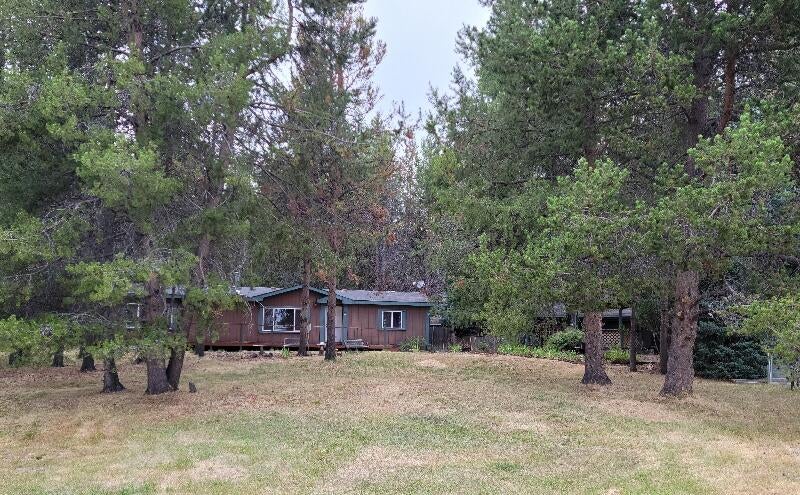 52901 Timber Ln Loop La Pine, OR 97739 - Photo 1 of 26 Home sits back off the street for additional privacy. And plenty of trees!