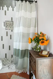 a vase of flowers sitting on a table