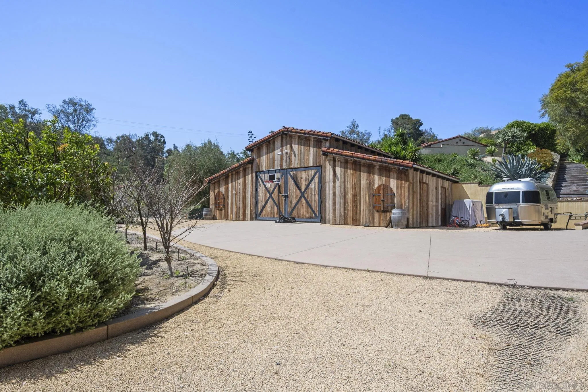 5616 La Sencilla Rancho Santa Fe, CA 92067 - Photo 11 of 23 Barn can be used as gym / work out wellness area. Ready horses with arena.