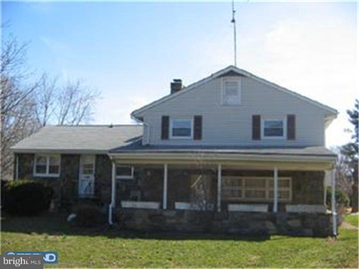 7 Greentree Road Hamilton, NJ 08619 - Photo 2 of 18 a front view of a house with garden