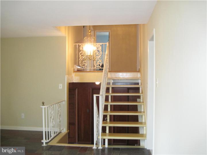 7 Greentree Road Hamilton, NJ 08619 - Photo 11 of 18 a view of walk in closet with empty racks