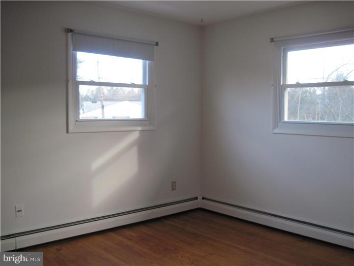7 Greentree Road Hamilton, NJ 08619 - Photo 17 of 18 an empty room with a window