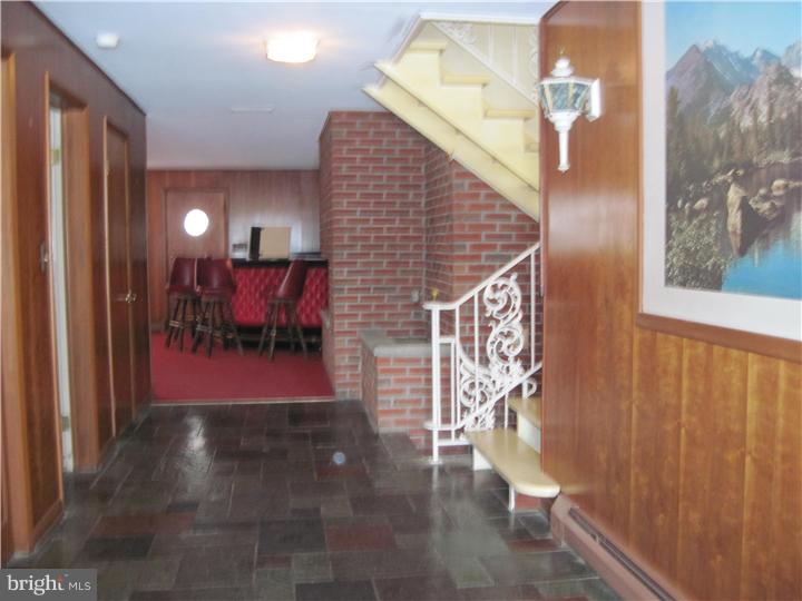 7 Greentree Road Hamilton, NJ 08619 - Photo 4 of 18 a view of entryway door with dining room and stairs