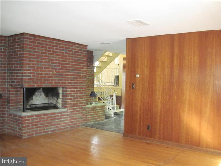 7 Greentree Road Hamilton, NJ 08619 - Photo 5 of 18 a view of an empty room and wooden floor