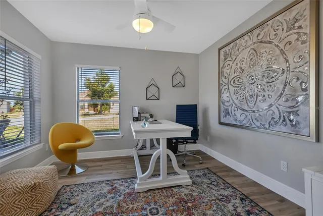 a view of a livingroom with furniture and window