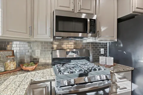 a room with wooden floor and window